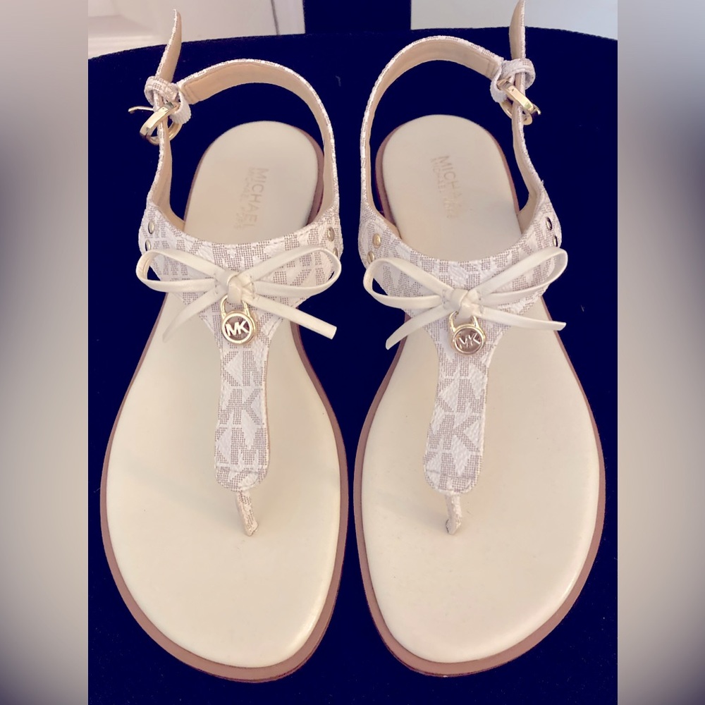 Never worn Michael Kors white thong sandals size 6